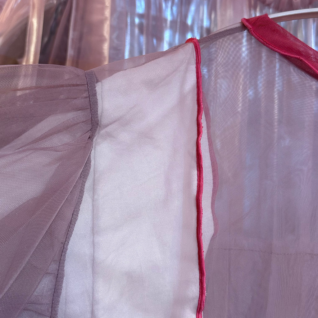 ピンクシアーフリル長袖トップス